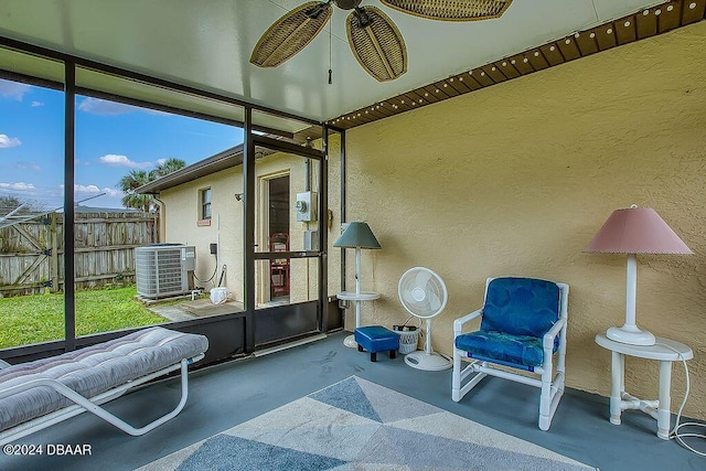 sunroom / solarium with ceiling fan and a wealth of natural light