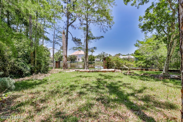 view of yard with fence