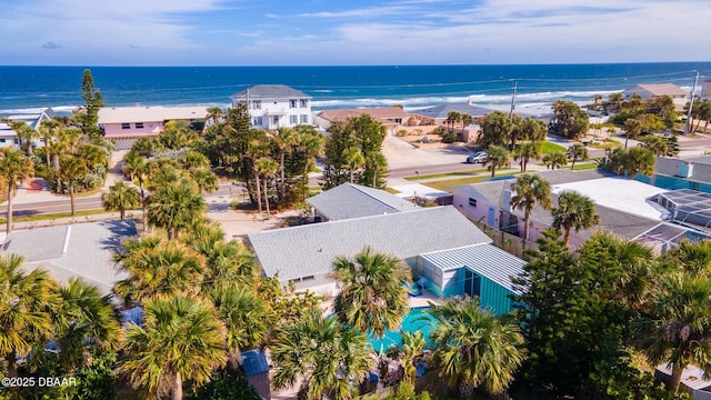 bird's eye view with a water view and a view of the beach