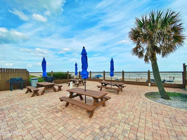 view of patio / terrace featuring a water view