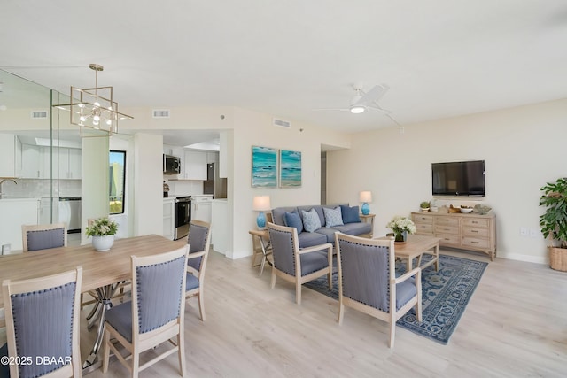 1 Oceans W Blvd Unit 7B5, Daytona Beach, FL 32118 - living room with light wood-type flooring and visible vents