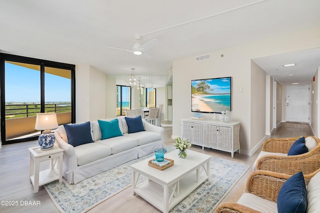 1 Oceans W Blvd Unit 7B5, Daytona Beach, FL 32118 - living area featuring a wealth of natural light, light wood-style flooring, and visible vents