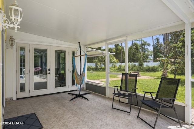 10 Pointing Pl, Palm Coast, FL 32164 - unfurnished sunroom with french doors and vaulted ceiling