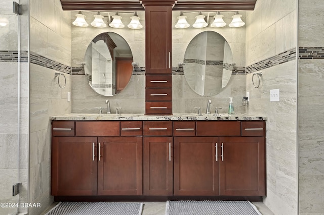 10 Pointing Pl, Palm Coast, FL 32164 - bathroom featuring tile walls and double vanity