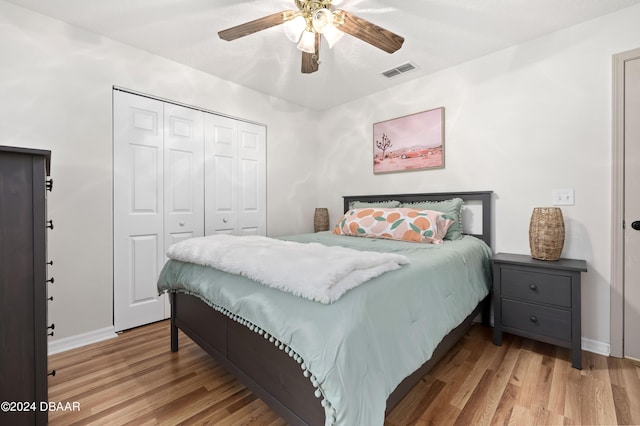 10 Pointing Pl, Palm Coast, FL 32164 - bedroom with light wood-style floors, a closet, baseboards, and a ceiling fan