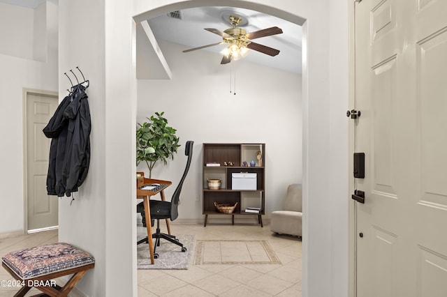10 Pointing Pl, Palm Coast, FL 32164 - office space featuring light tile patterned flooring, ceiling fan, arched walkways, baseboards, and lofted ceiling