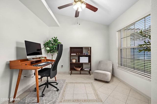 tiled office featuring vaulted ceiling and ceiling fan