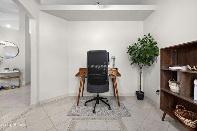 10 Pointing Pl, Palm Coast, FL 32164 - office featuring light tile patterned floors, arched walkways, and baseboards