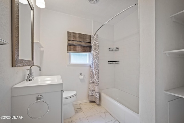 full bathroom with shower / bath combo, vanity, and toilet