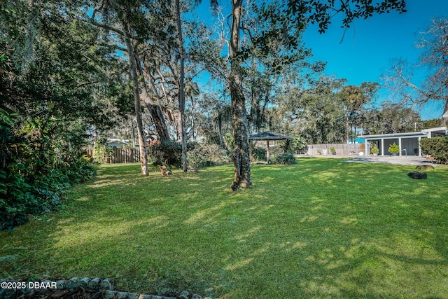 view of yard featuring a gazebo and a patio