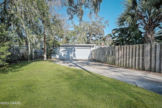 garage with a lawn