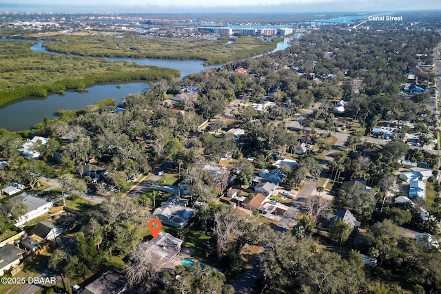 drone / aerial view with a water view