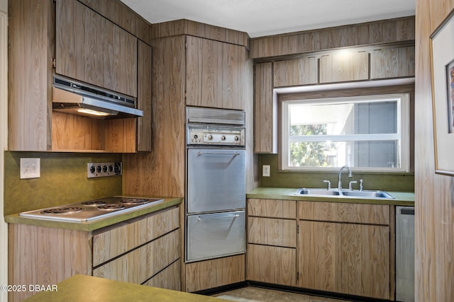 kitchen with sink and appliances with stainless steel finishes