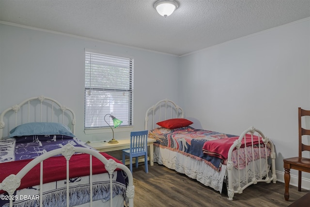 43 Jacaranda Cay Ct Unit 430, New Smyrna Beach, FL 32169 - bedroom with a textured ceiling, ornamental molding, and wood finished floors
