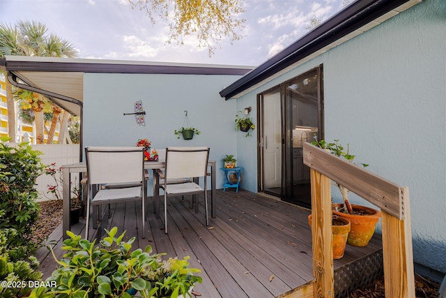 43 Jacaranda Cay Ct Unit 430, New Smyrna Beach, FL 32169 - wooden deck with outdoor dining space
