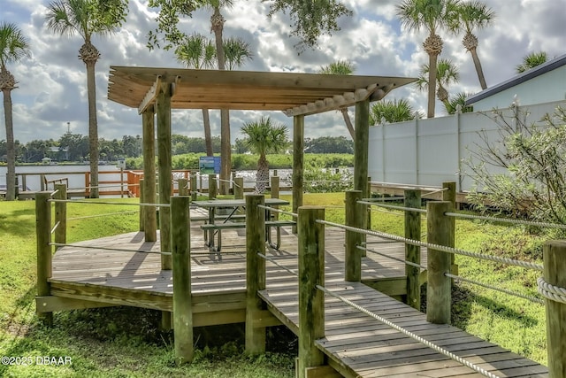 43 Jacaranda Cay Ct Unit 430, New Smyrna Beach, FL 32169 - view of dock with a yard and a wooden deck