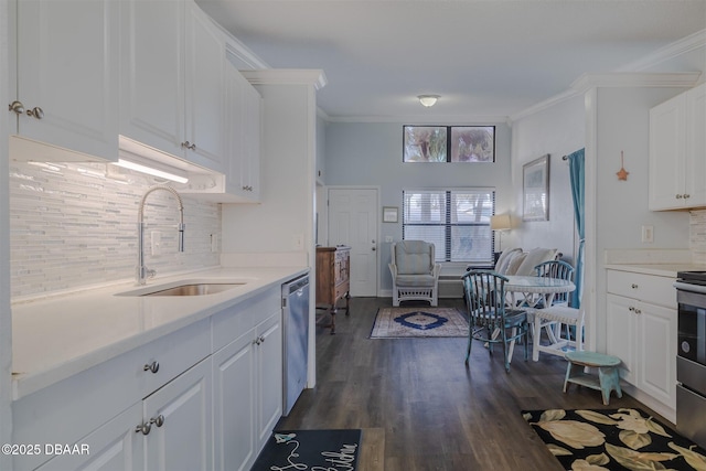 43 Jacaranda Cay Ct Unit 430, New Smyrna Beach, FL 32169 - kitchen with light countertops, ornamental molding, white cabinetry, a sink, and dishwasher