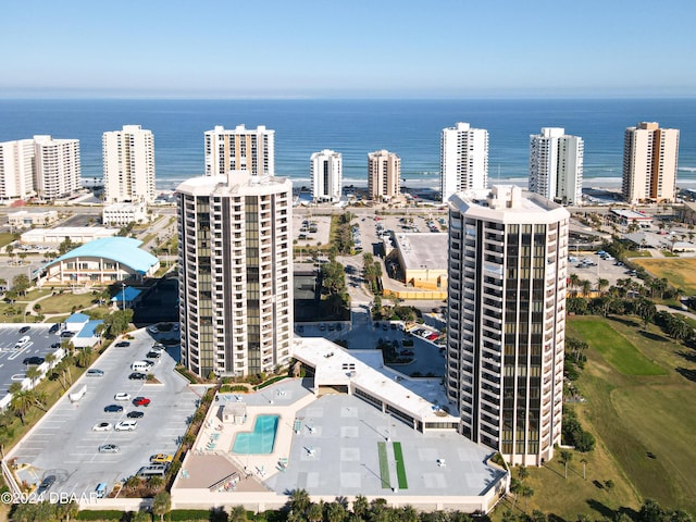 bird's eye view featuring a city view and a water view