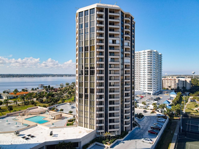 view of property featuring a view of city and a water view