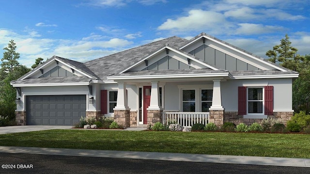 craftsman-style home featuring a porch, a garage, and a front lawn