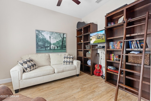 6871 Forkmead Ln, Port Orange, FL 32128 - living area featuring ceiling fan and wood finished floors