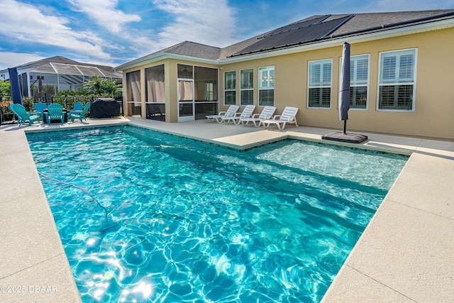 6871 Forkmead Ln, Port Orange, FL 32128 - view of swimming pool with a sunroom and a patio area
