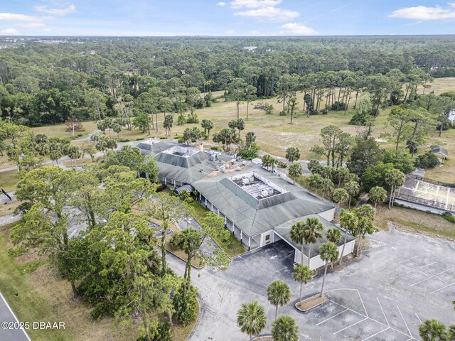 108 Shoal Creek Cir, Daytona Beach, FL 32114 - drone / aerial view with a wooded view