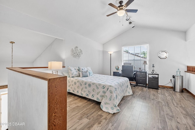 108 Shoal Creek Cir, Daytona Beach, FL 32114 - bedroom featuring lofted ceiling, wood finished floors, a ceiling fan, and baseboards
