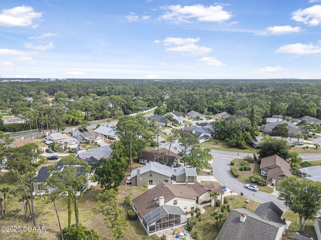 108 Shoal Creek Cir, Daytona Beach, FL 32114 - birds eye view of property with a wooded view and a residential view