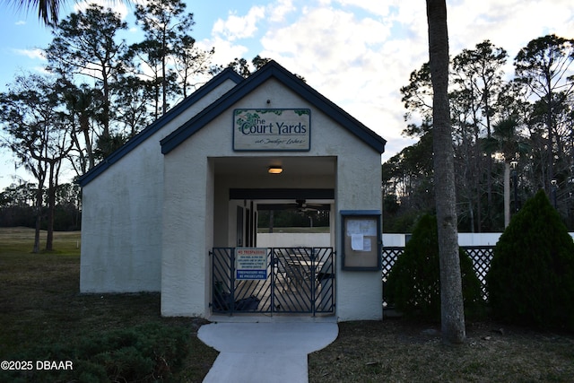 view of property with fence