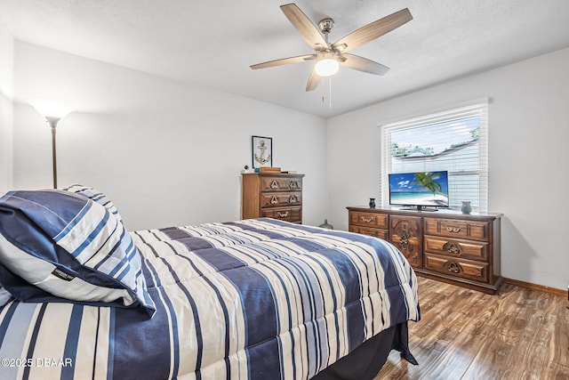 108 Shoal Creek Cir, Daytona Beach, FL 32114 - bedroom with a ceiling fan, wood finished floors, and baseboards