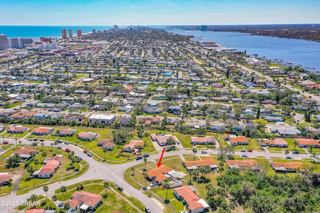 drone / aerial view featuring a water view