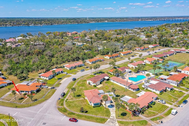 aerial view featuring a water view and a residential view