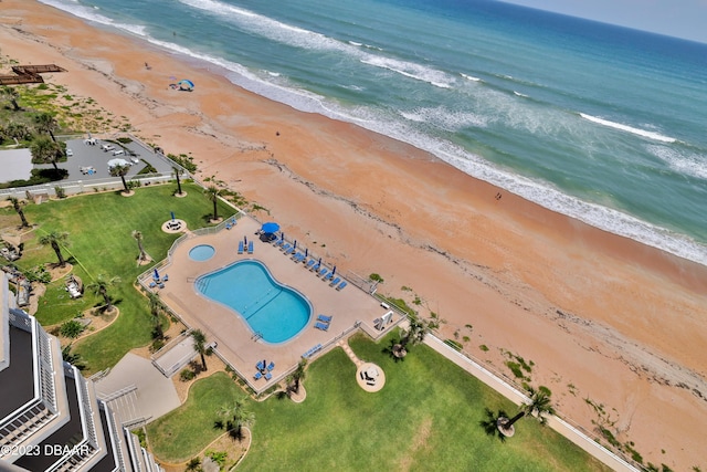 drone / aerial view with a view of the beach and a water view