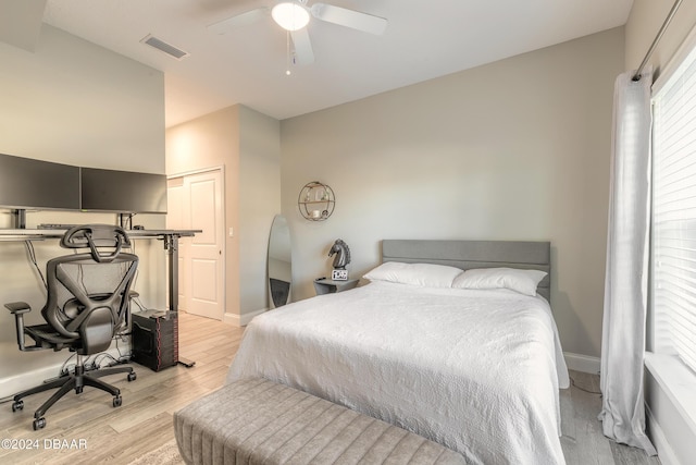 bedroom featuring ceiling fan and light wood-type flooring