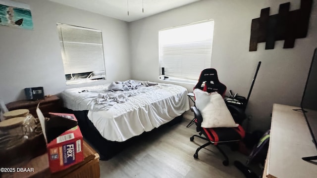 bedroom featuring hardwood / wood-style floors