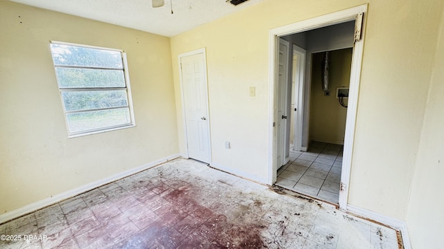 unfurnished bedroom featuring a textured ceiling