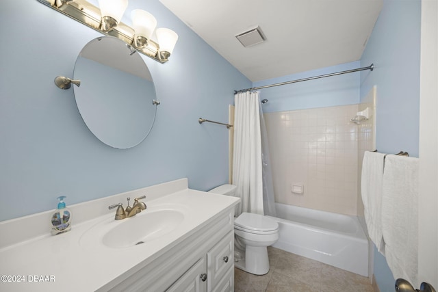 full bathroom featuring vanity, toilet, tile patterned flooring, and shower / bath combo with shower curtain