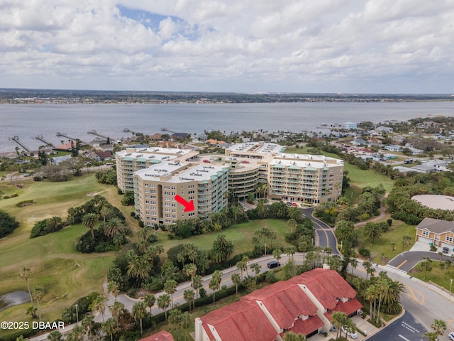 bird's eye view featuring a water view and golf course view