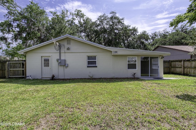 1704 Travelers Palm Dr, Edgewater, FL 32132 - rear view of house with a sunroom