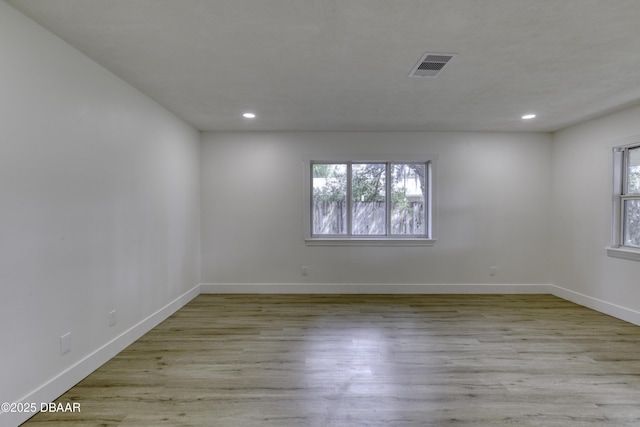 1704 Travelers Palm Dr, Edgewater, FL 32132 - unfurnished room with recessed lighting, baseboards, and wood finished floors