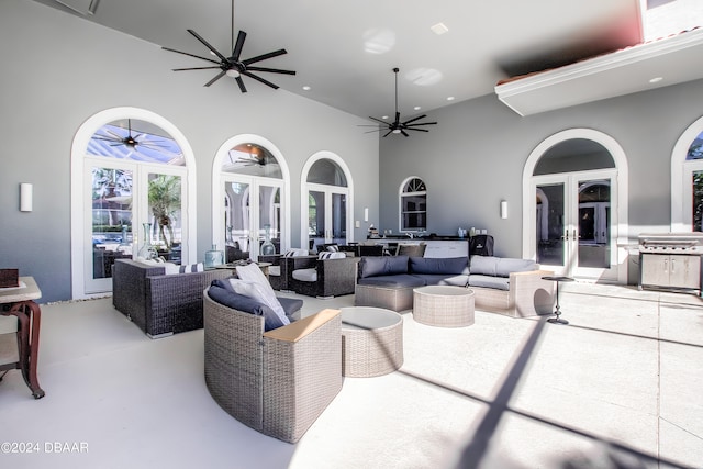 view of patio / terrace with outdoor lounge area, french doors, and ceiling fan