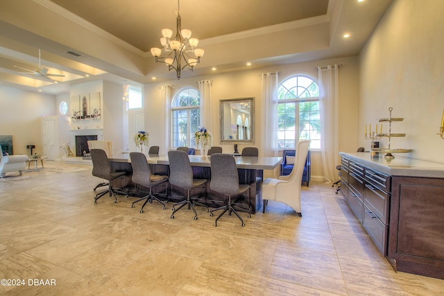 2540 Taxiway Echo, Port Orange, FL 32128 - dining room with a tray ceiling, recessed lighting, a chandelier, ornamental molding, and a ceiling fan