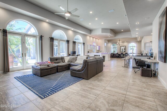 2540 Taxiway Echo, Port Orange, FL 32128 - living room with french doors, ceiling fan, recessed lighting, and a chandelier
