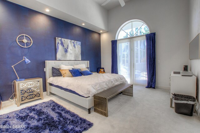 2540 Taxiway Echo, Port Orange, FL 32128 - bedroom with a towering ceiling, access to outside, carpet floors, and recessed lighting