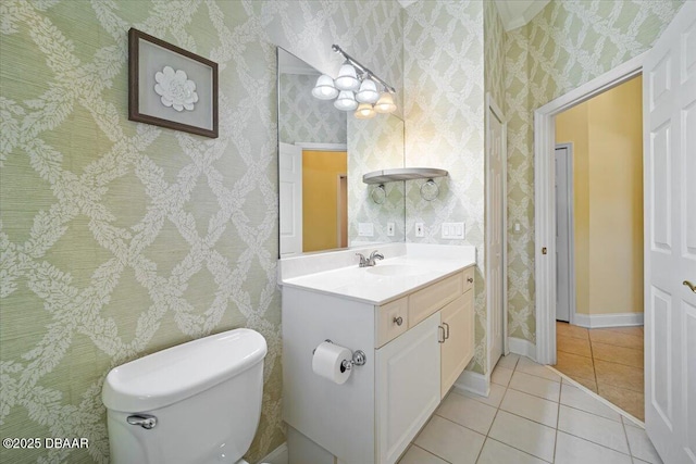 bathroom with vanity, tile patterned floors, and toilet