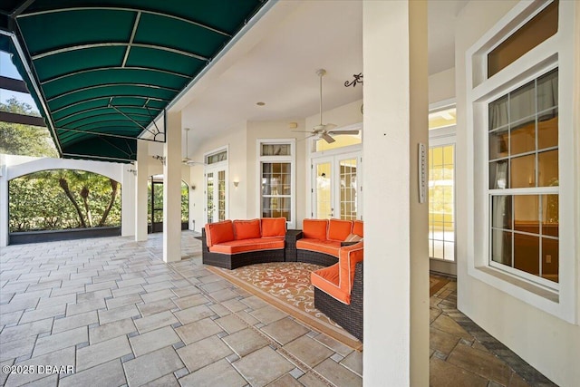 view of patio / terrace featuring outdoor lounge area and ceiling fan