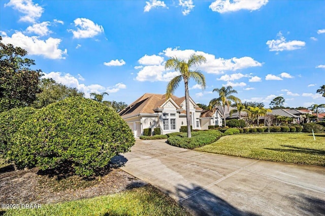 view of front of home with a front lawn