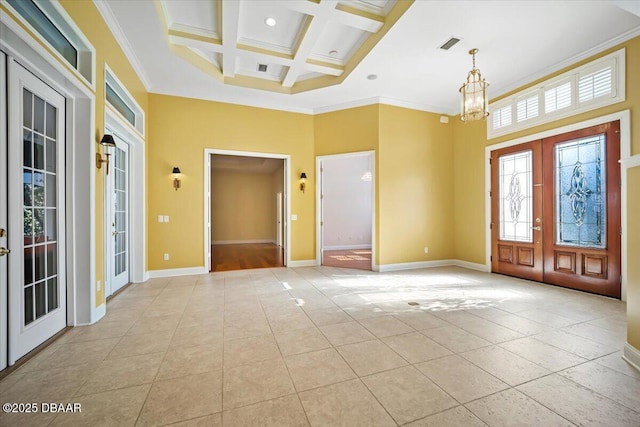 foyer with french doors, coffered ceiling, an inviting chandelier, crown molding, and a towering ceiling