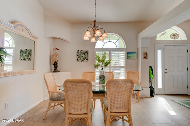 dining area featuring a chandelier